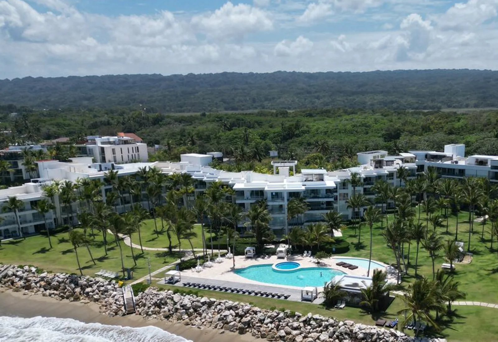 Aerial view of a coastal estate at golden hour